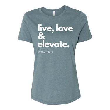Embrace positivity and style with the 'Live, Love & Elevate' women’s relaxed fit t-shirt. Made from soft, breathable fabric, this shirt offers both comfort and flair with a flattering, relaxed silhouette. Whether you're out with friends or enjoying a casual day, the inspirational message encourages you to live your best life and elevate your mood. Perfect for pairing with jeans, leggings, or shorts, this versatile tee adds a touch of motivation and style to any wardrobe.